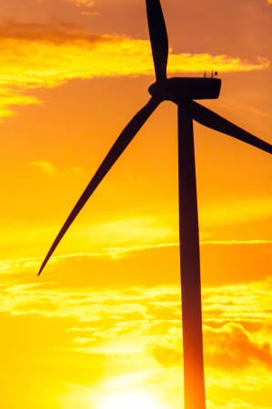 An image of wind turbines at sunsetの写真素材