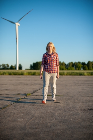 portrait of freckled blonde outside wearing a plaid shirtの写真素材