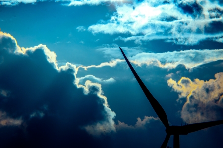 An image of wind turbines at sunsetの写真素材
