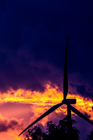 An image of wind turbines at sunsetの写真素材