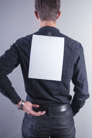 an image of young handsome businessman with blank cardの写真素材