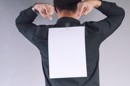 an image of young handsome businessman with blank cardの写真素材