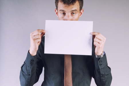 an image of young handsome businessman with blank cardの写真素材