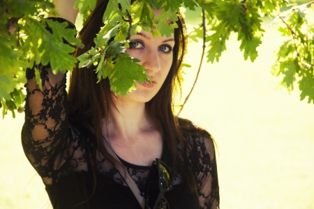 an image of beautiful young girl in the park at Sunsetの写真素材