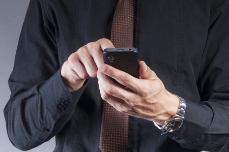 an image of businessman using a mobile phoneの写真素材