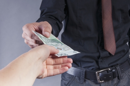 an image of businessman is eating a sandwich with moneyの写真素材