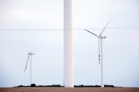 an image of windtrubine at sunset
