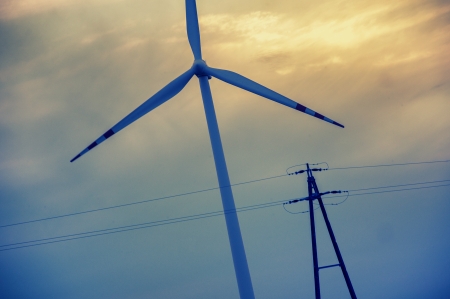 an image of windtrubine at sunset