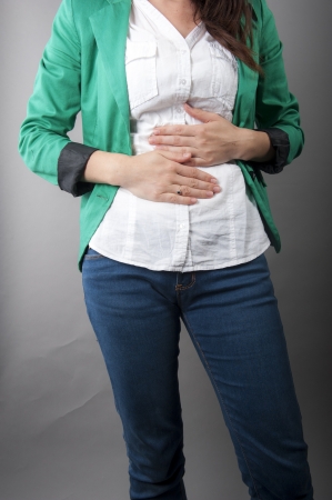 an image of Businesswoman with abdominal painsの写真素材
