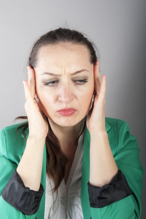 an image of businesswoman with headache の写真素材