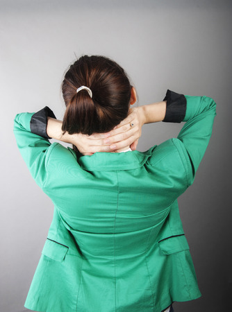 an image of businesswoman with back pain の写真素材