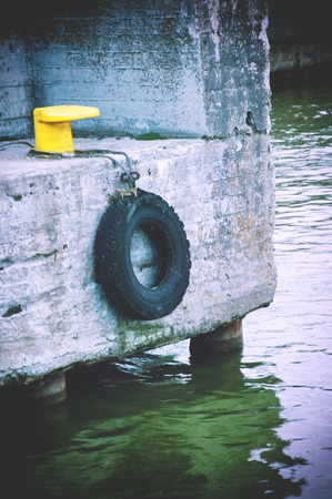 An image of boat moored in the harbor