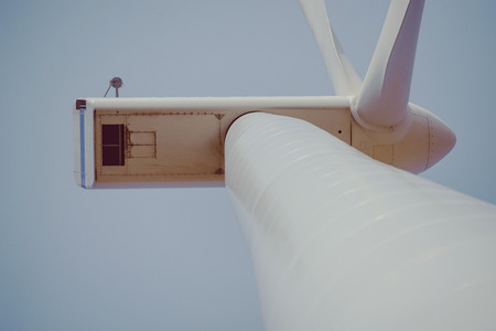 wind trubine at sunny day with blue skyの写真素材