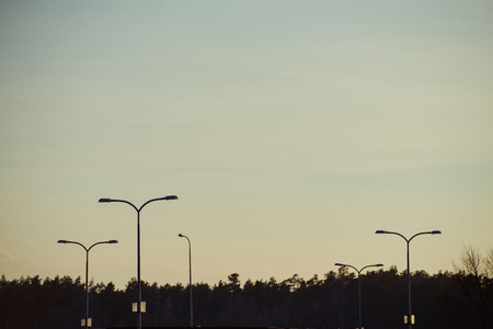 Street lamp against nature background at duskの写真素材