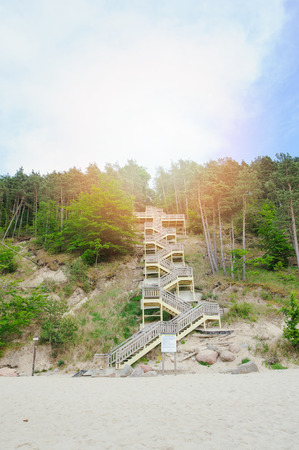 new wooden stairs leading to the beachの写真素材