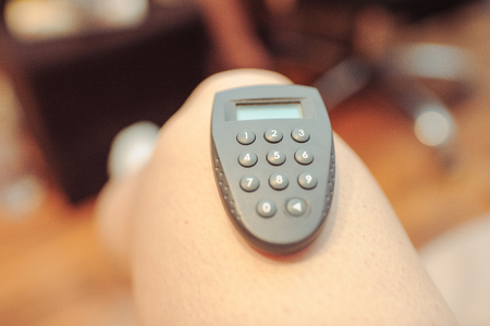 Security net banking token close up on female legの写真素材