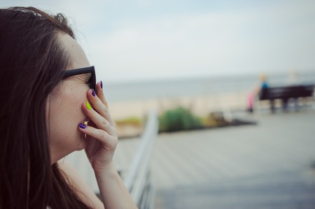 beautiful portrait of a carefree friendly approachable girl with a stunning smile and cute looksの写真素材