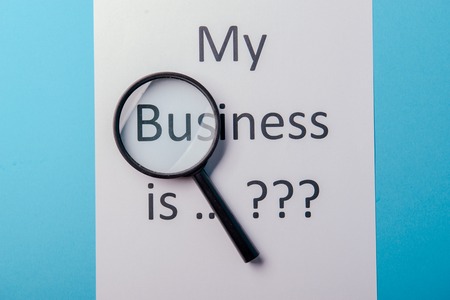 My business is word concept. Business word with business document paper on blue background. For business concept ideas background.の写真素材