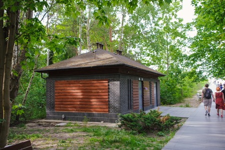 New wooden restroom or toilet building in the city
