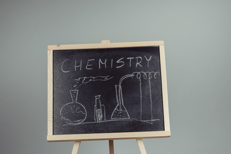 Blackboard with the chemical formula, gray backgroundの写真素材