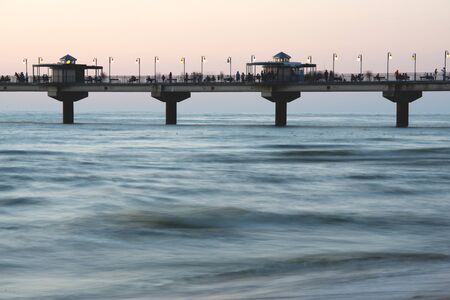 Pier on the Black Sea coast in the evening. Sunset time