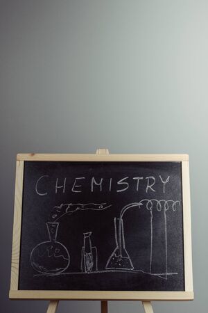 Blackboard with the chemical formula, gray backgroundの写真素材