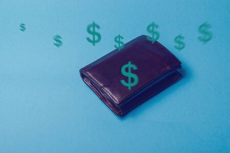 brown mans leather wallet on a blue backgroundの写真素材