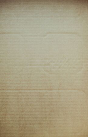 Vertically oriented view of cardboard texture backgroundの写真素材