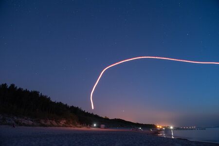 Baltic sea at beautiful sunset in Miedzyzdroje beach, city where the festival of stars takes place every year . Polish baltic coast. Famous city among the tourist.の写真素材