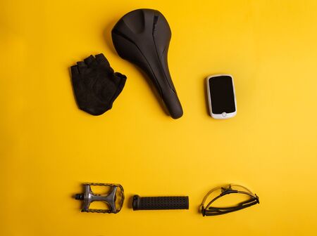 Bicycle, Cycling accessories on the yellow background. view from aboveの写真素材