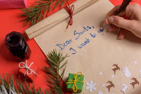 Empty letter for Santa Claus. Copy space. Red backgroundの写真素材