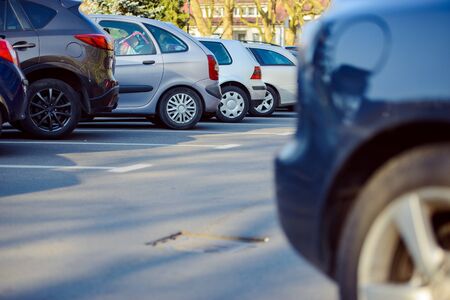 View of tightly packed cars in parking lot.の写真素材