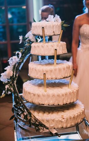 Delicious Wedding Cake at the party. Smoke and fire effectsの写真素材