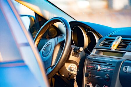 Interior view of car focus on the steering wheelの写真素材