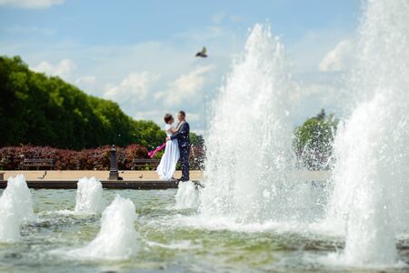Bride and groom at a photo session in the nature.の写真素材