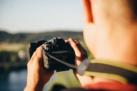 Photographer's boyfriend takes a photo. Summer season. Nature and landscape photography
