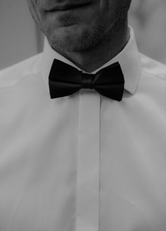 Groom's wedding accessories. Bow tie, suit, cufflinks, belt and shoesの写真素材