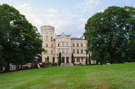 Renaissance historic palace in Poland, surrounding by beautiful green gardenのeditorial素材