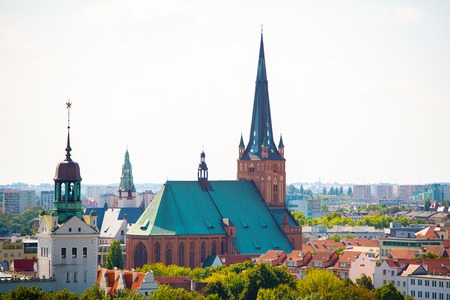 Cityscape with Odra river. Szczecin historical city with architectural layout similar to Paris. Castle of Pomeranian dukes in Szczecin and Basilica of Saint Jamesのeditorial素材