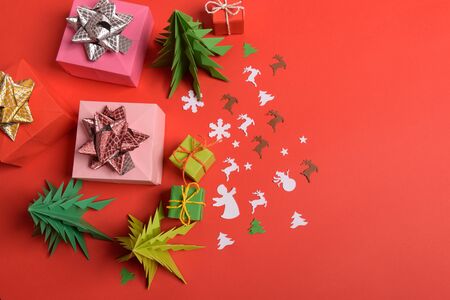Christmas or New Year background, plain composition made of Xmas decorations and fir branches, flat lay, blank space for a greeting text.の写真素材