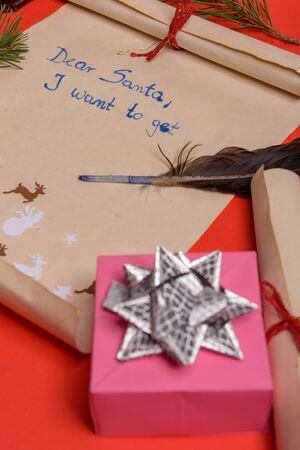Empty letter for Santa Claus. Copy space. Red backgroundの写真素材