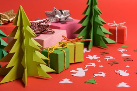 Christmas or New Year background, plain composition made of Xmas decorations and fir branches, flat lay, blank space for a greeting text.の写真素材