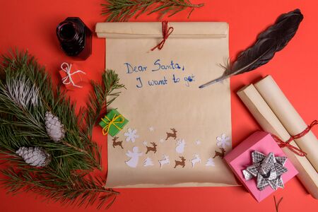 Empty letter for Santa Claus. Copy space. Red backgroundの写真素材
