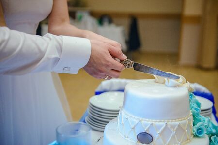 Delicious Wedding Cake at the party. Smoke and fire effectsの写真素材