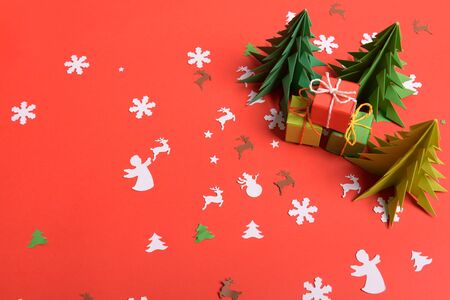 Christmas or New Year background, plain composition made of Xmas decorations and fir branches, flat lay, blank space for a greeting text.の写真素材