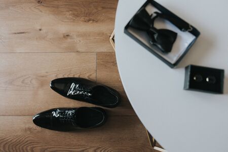 Groom black elegant shoes. Wedding detail. Close upの写真素材