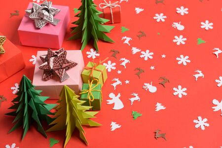 Christmas or New Year background, plain composition made of Xmas decorations and fir branches, flat lay, blank space for a greeting text.の写真素材