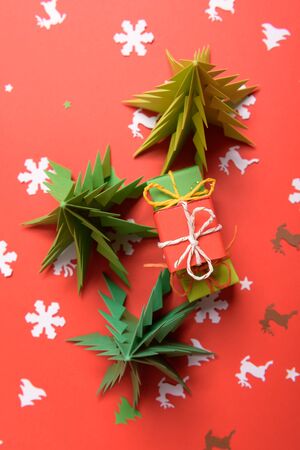 Christmas or New Year background, plain composition made of Xmas decorations and fir branches, flat lay, blank space for a greeting text.の写真素材