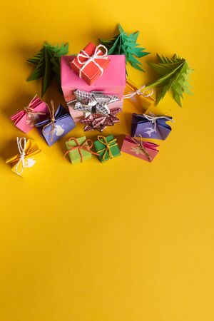 Christmas or New Year background, plain composition made of Xmas decorations and fir branches, flat lay, blank space for a greeting text.の写真素材