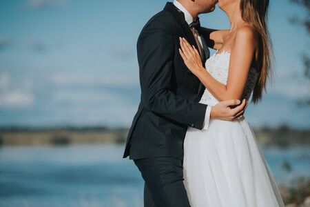 Bride and groom at a photo session in the nature.の写真素材